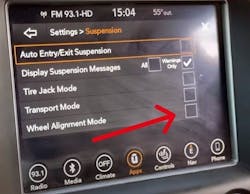 This photo of the dash on a 2014 Jeep Cherokee shows the Wheel Alignment Mode softkey, to instruct the air suspension control module to put the vehicles suspension in the correct position for an alignment to take place.